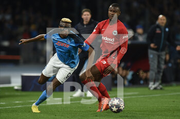 2023-03-15 - Victor Osimhen of SSC Napoli  competes for the ball with Evan N'Dicka of Eintracht Frankfurt  during the Uefa Champions League  match between SSC Napoli v Eintracht Frankfurt  at Diego Armando Maradona Stadium  - SSC NAPOLI VS EINTRACHT FRANKFURT - UEFA CHAMPIONS LEAGUE - SOCCER