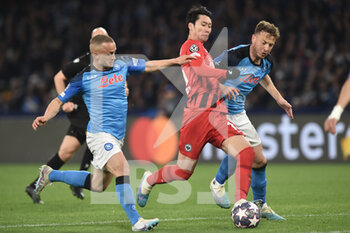 2023-03-15 - Amir Rrahmani of SSC Napoli  competes for the ball with Daichi Kamada of Eintracht Frankfurt  during the Uefa Champions League  match between SSC Napoli v Eintracht Frankfurt  at Diego Armando Maradona Stadium  - SSC NAPOLI VS EINTRACHT FRANKFURT - UEFA CHAMPIONS LEAGUE - SOCCER