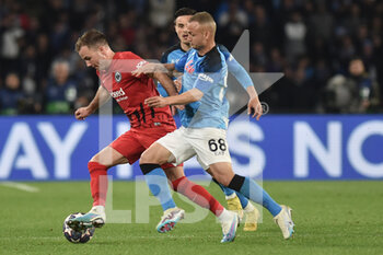 2023-03-15 - Stanislav Lobotka of SSC Napoli competes for the ball with Sebastian Rode of Eintracht Frankfurt  during the Uefa Champions League  match between SSC Napoli v Eintracht Frankfurt  at Diego Armando Maradona Stadium  - SSC NAPOLI VS EINTRACHT FRANKFURT - UEFA CHAMPIONS LEAGUE - SOCCER