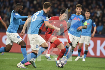 2023-03-15 - Tanguy Ndombele' of SSC Napoli  competes for the ball with Daichi Kamada of Eintracht Frankfurt  during the Uefa Champions League  match between SSC Napoli v Eintracht Frankfurt  at Diego Armando Maradona Stadium  - SSC NAPOLI VS EINTRACHT FRANKFURT - UEFA CHAMPIONS LEAGUE - SOCCER