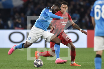 2023-03-15 - Tanguy Ndombele' of SSC Napoli  competes for the ball with  Tuta of Eintracht Frankfurt during the Uefa Champions League  match between SSC Napoli v Eintracht Frankfurt  at Diego Armando Maradona Stadium  - SSC NAPOLI VS EINTRACHT FRANKFURT - UEFA CHAMPIONS LEAGUE - SOCCER