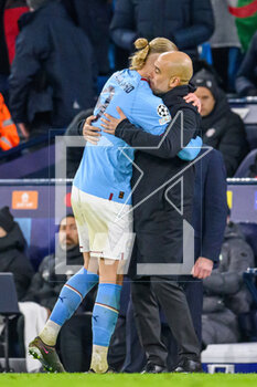 2023-03-14 - Erling Haaland of Manchester City is congratulated by Manchester City manager, Pep Guardiola after being substituted during the UEFA Champions League, Round of 16, 2nd leg football match between Manchester City and RB Leipzig on 14 March 2023 at the Etihad Stadium in Manchester, England - FOOTBALL - CHAMPIONS LEAGUE - MANCHESTER CITY V RB LEIPZIG - UEFA CHAMPIONS LEAGUE - SOCCER
