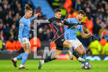 2023-03-14 - Andre Silva of RB Leipzig and Ruben Dias, Kalvin Phillips of Manchester City during the UEFA Champions League, Round of 16, 2nd leg football match between Manchester City and RB Leipzig on 14 March 2023 at the Etihad Stadium in Manchester, England - FOOTBALL - CHAMPIONS LEAGUE - MANCHESTER CITY V RB LEIPZIG - UEFA CHAMPIONS LEAGUE - SOCCER