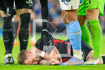 2023-03-14 - David Raum of RB Leipzig lies injured during the UEFA Champions League, Round of 16, 2nd leg football match between Manchester City and RB Leipzig on 14 March 2023 at the Etihad Stadium in Manchester, England - FOOTBALL - CHAMPIONS LEAGUE - MANCHESTER CITY V RB LEIPZIG - UEFA CHAMPIONS LEAGUE - SOCCER