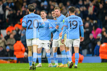 2023-03-14 - Kevin De Brunye of Manchester City in mobbed by is team mates after he scores a goal 7-0 during the UEFA Champions League, Round of 16, 2nd leg football match between Manchester City and RB Leipzig on 14 March 2023 at the Etihad Stadium in Manchester, England - FOOTBALL - CHAMPIONS LEAGUE - MANCHESTER CITY V RB LEIPZIG - UEFA CHAMPIONS LEAGUE - SOCCER
