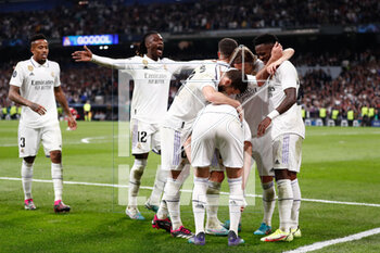 2023-03-15 - Karim Benzema of Real Madrid celebrates a goal 1-0 with teammates during the UEFA Champions League, Round of 16, 2nd leg football match between Real Madrid CF and Liverpool FC on March 15, 2023 at Santiago Bernabeu stadium in Madrid, Spain - FOOTBALL - CHAMPIONS LEAGUE - REAL MADRID V LIVERPOOL - UEFA CHAMPIONS LEAGUE - SOCCER