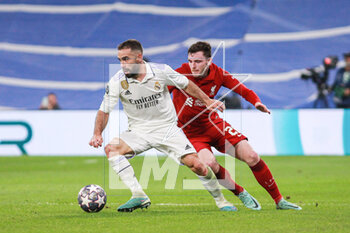 2023-03-15 - Daniel Carvajal of Real Madrid and Andy Robertson of Liverpool during the UEFA Champions League, Round of 16, 2nd leg football match between Real Madrid CF and Liverpool FC on March 15, 2023 at Santiago Bernabeu stadium in Madrid, Spain - FOOTBALL - CHAMPIONS LEAGUE - REAL MADRID V LIVERPOOL - UEFA CHAMPIONS LEAGUE - SOCCER