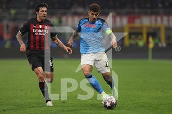 2023-04-12 - Giovanni Di Lorenzo of SSC Napoli competes for the ball with Sandro Tonali of AC Milan during UEFA Champions League 2022/23 Quarter-Finals - First  leg football match between AC Milan and SSC Napoli at San Siro Stadium, Milan, Italy on April 12, 2023 - AC MILAN VS SSC NAPOLI - UEFA CHAMPIONS LEAGUE - SOCCER
