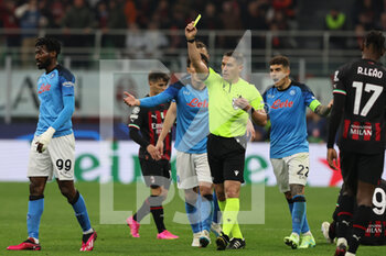 2023-04-12 - Andre Anguissa of SSC Napoli yellow card during UEFA Champions League 2022/23 Quarter-Finals - First  leg football match between AC Milan and SSC Napoli at San Siro Stadium, Milan, Italy on April 12, 2023 - AC MILAN VS SSC NAPOLI - UEFA CHAMPIONS LEAGUE - SOCCER