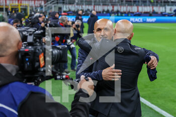 2023-04-12 - Luciano Spalletti Head Coach of SSC Napoli hugs Stefano Pioli Head Coach of AC Milan during UEFA Champions League 2022/23 Quarter-Finals - First  leg football match between AC Milan and SSC Napoli at San Siro Stadium, Milan, Italy on April 12, 2023 - AC MILAN VS SSC NAPOLI - UEFA CHAMPIONS LEAGUE - SOCCER