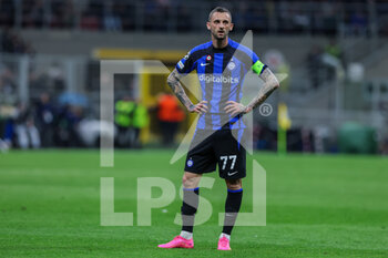 2023-04-19 - Marcelo Brozovic of FC Internazionale reacts during the UEFA Champions League 2022/23 Quarter-Finals - 2nd leg football match between FC Internazionale and SL Benfica at Giuseppe Meazza Stadium, Milan, Italy on April 19, 2023 - INTER - FC INTERNAZIONALE VS BENFICA - UEFA CHAMPIONS LEAGUE - SOCCER