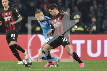 2023-04-18 - Brahim Diaz of AC Milan competes for the ball with Stanislav Lobotka of SSC Napoli   during the Uefa Champions League  match between SSC Napoli vs AC Milan  at Diego Armando Maradona Stadium - SSC NAPOLI VS AC MILAN - UEFA CHAMPIONS LEAGUE - SOCCER