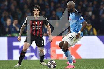 2023-04-18 - Tanguy Ndombele' of SSC Napoli  competes for the ball with Sandro Tonali of AC Milan during the Uefa Champions League  match between SSC Napoli vs AC Milan  at Diego Armando Maradona Stadium - SSC NAPOLI VS AC MILAN - UEFA CHAMPIONS LEAGUE - SOCCER