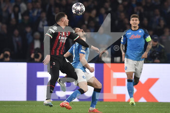 2023-04-18 - Ismael Bennacer of AC Milan competes for the ball with Mario Rui of SSC Napoli  during the Uefa Champions League  match between SSC Napoli vs AC Milan  at Diego Armando Maradona Stadium - SSC NAPOLI VS AC MILAN - UEFA CHAMPIONS LEAGUE - SOCCER