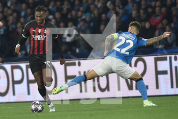 2023-04-18 - Rafael Leao of AC Milan competes for the ball with Giovanni Di Lorenzo of SSC Napoli  during the Uefa Champions League  match between SSC Napoli vs AC Milan  at Diego Armando Maradona Stadium - SSC NAPOLI VS AC MILAN - UEFA CHAMPIONS LEAGUE - SOCCER