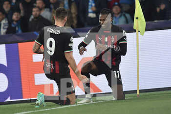 2023-04-18 - Olivier Giroud of AC Milan exult com Rafael Leao of AC Milan  during the Uefa Champions League  match between SSC Napoli vs AC Milan  at Diego Armando Maradona Stadium - SSC NAPOLI VS AC MILAN - UEFA CHAMPIONS LEAGUE - SOCCER