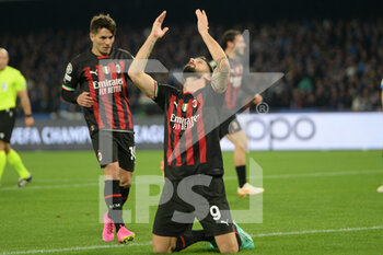 2023-04-18 - Olivier Giroud of AC Milan cheers after the goal scored  during the Uefa Champions League  match between SSC Napoli vs AC Milan  at Diego Armando Maradona Stadium - SSC NAPOLI VS AC MILAN - UEFA CHAMPIONS LEAGUE - SOCCER