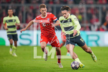 2023-04-19 - Jack Grealish of Manchester City and Joshua Kimmich of Bayern Munich during the UEFA Champions League, Quarter-finals, 2nd leg football match between Bayern Munich and Manchester City on 19 April 2023 at Allianz Arena in Munich, Germany - FOOTBALL - CHAMPIONS LEAGUE - BAYERN MUNICH V MANCHESTER CITY - UEFA CHAMPIONS LEAGUE - SOCCER