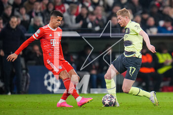 2023-04-19 - Kevin De Bruyne of Manchester City and Joao Cancelo of Bayern Munich during the UEFA Champions League, Quarter-finals, 2nd leg football match between Bayern Munich and Manchester City on 19 April 2023 at Allianz Arena in Munich, Germany - FOOTBALL - CHAMPIONS LEAGUE - BAYERN MUNICH V MANCHESTER CITY - UEFA CHAMPIONS LEAGUE - SOCCER