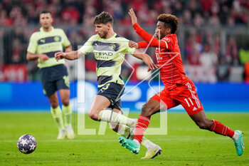 2023-04-19 - Ruben Dias of Manchester City and Kingsley Coman of Bayern Munich during the UEFA Champions League, Quarter-finals, 2nd leg football match between Bayern Munich and Manchester City on 19 April 2023 at Allianz Arena in Munich, Germany - FOOTBALL - CHAMPIONS LEAGUE - BAYERN MUNICH V MANCHESTER CITY - UEFA CHAMPIONS LEAGUE - SOCCER