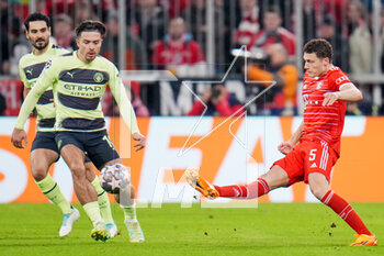 2023-04-19 - Benjamin Pavard of Bayern Munich and Jack Grealish of Manchester City during the UEFA Champions League, Quarter-finals, 2nd leg football match between Bayern Munich and Manchester City on 19 April 2023 at Allianz Arena in Munich, Germany - FOOTBALL - CHAMPIONS LEAGUE - BAYERN MUNICH V MANCHESTER CITY - UEFA CHAMPIONS LEAGUE - SOCCER