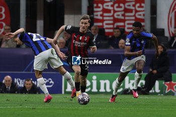 2023-05-10 - Alexis Saelemaekers of AC Milan in action during UEFA Champions League 2022/23 Semi-Final 1st  leg football match between AC Milan and FC Internazionale at San Siro Stadium, Milan, Italy on May 10, 2023 - SEMIFINAL - AC MILAN VS INTER - FC INTERNAZIONALE - UEFA CHAMPIONS LEAGUE - SOCCER