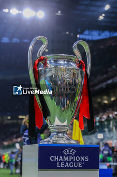 2023-05-10 - UEFA Champions League Trophy on a plinth during UEFA Champions League 2022/23 Semi-Final 1st  leg football match between AC Milan and FC Internazionale at San Siro Stadium, Milan, Italy on May 10, 2023 - SEMIFINAL - AC MILAN VS INTER - FC INTERNAZIONALE - UEFA CHAMPIONS LEAGUE - SOCCER