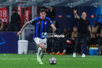 2023-05-10 - Alessandro Bastoni of FC Internazionale in action during UEFA Champions League 2022/23 Semi-Final 1st  leg football match between AC Milan and FC Internazionale at San Siro Stadium, Milan, Italy on May 10, 2023 - SEMIFINAL - AC MILAN VS INTER - FC INTERNAZIONALE - UEFA CHAMPIONS LEAGUE - SOCCER