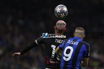 2023-05-16 - Theo Hernandez of AC Milan competes for the ball with Edin Dzeko of FC Internazionale during the UEFA Champions League 2022/23 Semi-Final second leg football match between FC Internazionale and AC Milan at Giuseppe Meazza Stadium, Milan, Italy on May 16, 2023 - SEMIFINAL - INTER - FC INTERNAZIONALE VS AC MILAN - UEFA CHAMPIONS LEAGUE - SOCCER