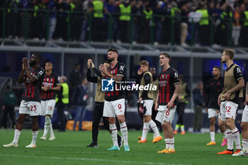 2023-05-16 - Olivier Giroud of AC Milan greets his fans after side's defeat during the UEFA Champions League 2022/23 Semi-Final second leg football match between FC Internazionale and AC Milan at Giuseppe Meazza Stadium, Milan, Italy on May 16, 2023 - SEMIFINAL - INTER - FC INTERNAZIONALE VS AC MILAN - UEFA CHAMPIONS LEAGUE - SOCCER