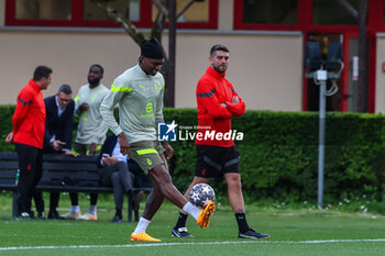2023-05-15 - Rafael Leao of AC Milan warms up during the AC Milan training session at Milanello Sports Center ahead of their UEFA Champions League semi-final second leg match against FC Internazionale at San Siro Stadium, Milan, Italy on May 15, 2023 - AC MILAN TRAINING BEFORE THE INTER V MILAN MATCH - UEFA CHAMPIONS LEAGUE - SOCCER