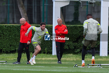 2023-05-15 - Davide Calabria of AC Milan warms up during the AC Milan training session at Milanello Sports Center ahead of their UEFA Champions League semi-final second leg match against FC Internazionale at San Siro Stadium, Milan, Italy on May 15, 2023 - AC MILAN TRAINING BEFORE THE INTER V MILAN MATCH - UEFA CHAMPIONS LEAGUE - SOCCER
