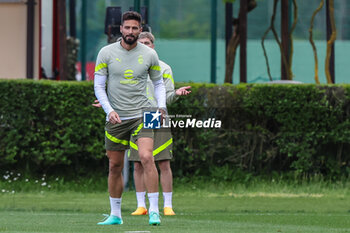 2023-05-15 - Olivier Giroud of AC Milan warms up during the AC Milan training session at Milanello Sports Center ahead of their UEFA Champions League semi-final second leg match against FC Internazionale at San Siro Stadium, Milan, Italy on May 15, 2023 - AC MILAN TRAINING BEFORE THE INTER V MILAN MATCH - UEFA CHAMPIONS LEAGUE - SOCCER