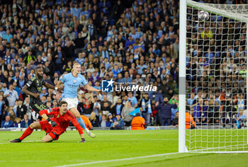 2023-05-18 - Erling Haaland (9) of Manchester City shoots towards the goal and hits the bar, Antonio Rudiger and Thibaut Courtois of Real Madrid during the UEFA Champions League, Semi-finals, 2nd leg football match between Manchester City and Real Madrid on 17 May 2023 at the Etihad Stadium in Manchester, England - FOOTBALL - CHAMPIONS LEAGUE - MANCHESTER CITY V REAL MADRID - UEFA CHAMPIONS LEAGUE - SOCCER