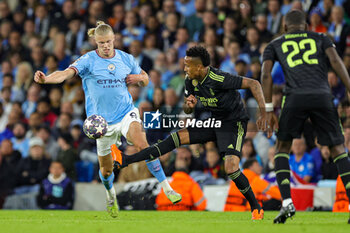 2023-05-18 - Erling Haaland (9) of Manchester City tussles with Eder Militao (3) of Real Madrid during the UEFA Champions League, Semi-finals, 2nd leg football match between Manchester City and Real Madrid on 17 May 2023 at the Etihad Stadium in Manchester, England - FOOTBALL - CHAMPIONS LEAGUE - MANCHESTER CITY V REAL MADRID - UEFA CHAMPIONS LEAGUE - SOCCER
