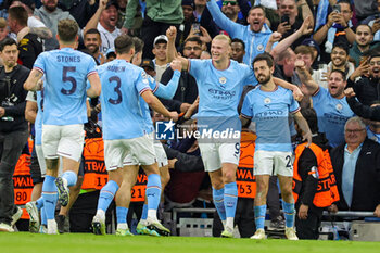 2023-05-18 - Bernardo Silva (20) of Manchester City scores a goal and celebrates with Erling Haaland 2-0 during the UEFA Champions League, Semi-finals, 2nd leg football match between Manchester City and Real Madrid on 17 May 2023 at the Etihad Stadium in Manchester, England - FOOTBALL - CHAMPIONS LEAGUE - MANCHESTER CITY V REAL MADRID - UEFA CHAMPIONS LEAGUE - SOCCER
