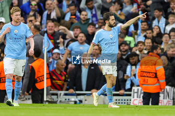2023-05-18 - Bernardo Silva (20) of Manchester City scores a goal and celebrates 1-0 during the UEFA Champions League, Semi-finals, 2nd leg football match between Manchester City and Real Madrid on 17 May 2023 at the Etihad Stadium in Manchester, England - FOOTBALL - CHAMPIONS LEAGUE - MANCHESTER CITY V REAL MADRID - UEFA CHAMPIONS LEAGUE - SOCCER
