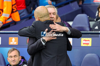 2023-05-18 - Pep Guardiola Manager of Manchester City greets Carlo Ancelotti Coach of Real Madrid during the UEFA Champions League, Semi-finals, 2nd leg football match between Manchester City and Real Madrid on 17 May 2023 at the Etihad Stadium in Manchester, England - FOOTBALL - CHAMPIONS LEAGUE - MANCHESTER CITY V REAL MADRID - UEFA CHAMPIONS LEAGUE - SOCCER