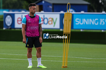 2023-06-05 - Lautaro Martinez of FC Internazionale looks on during the UEFA Champions League Final media day of FC Internazionale training session at Suning Training Center ahead of their UEFA Champions League Final match against Manchester City FC at Suning Training Center, Appiano Gentile, Italy on June 05, 2023 - INTER - FC INTERNAZIONALE TRAINING BEFORE THE 2022-2023 FINAL - UEFA CHAMPIONS LEAGUE - SOCCER
