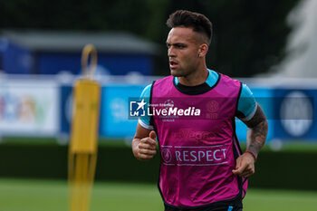 2023-06-05 - Lautaro Martinez of FC Internazionale looks on during the UEFA Champions League Final media day of FC Internazionale training session at Suning Training Center ahead of their UEFA Champions League Final match against Manchester City FC at Suning Training Center, Appiano Gentile, Italy on June 05, 2023 - INTER - FC INTERNAZIONALE TRAINING BEFORE THE 2022-2023 FINAL - UEFA CHAMPIONS LEAGUE - SOCCER