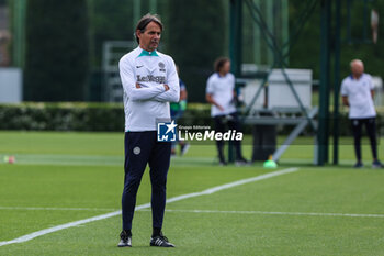 2023-06-05 - Simone Inzaghi Head Coach of FC Internazionale looks on during the UEFA Champions League Final media day of FC Internazionale training session at Suning Training Center ahead of their UEFA Champions League Final match against Manchester City FC at Suning Training Center, Appiano Gentile, Italy on June 05, 2023 - INTER - FC INTERNAZIONALE TRAINING BEFORE THE 2022-2023 FINAL - UEFA CHAMPIONS LEAGUE - SOCCER