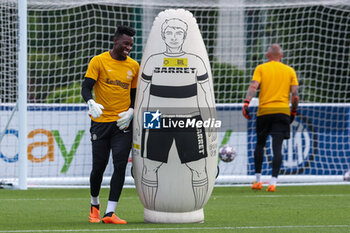 2023-06-05 - Andre Onana of FC Internazionale smiling during the UEFA Champions League Final media day of FC Internazionale training session at Suning Training Center ahead of their UEFA Champions League Final match against Manchester City FC at Suning Training Center, Appiano Gentile, Italy on June 05, 2023 - INTER - FC INTERNAZIONALE TRAINING BEFORE THE 2022-2023 FINAL - UEFA CHAMPIONS LEAGUE - SOCCER
