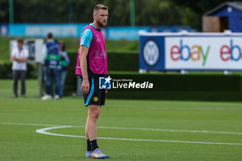 2023-06-05 - Milan Skriniar of FC Internazionale looks on during the UEFA Champions League Final media day of FC Internazionale training session at Suning Training Center ahead of their UEFA Champions League Final match against Manchester City FC at Suning Training Center, Appiano Gentile, Italy on June 05, 2023 - INTER - FC INTERNAZIONALE TRAINING BEFORE THE 2022-2023 FINAL - UEFA CHAMPIONS LEAGUE - SOCCER