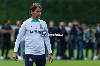 2023-06-05 - Simone Inzaghi Head Coach of FC Internazionale looks on during the UEFA Champions League Final media day of FC Internazionale training session at Suning Training Center ahead of their UEFA Champions League Final match against Manchester City FC at Suning Training Center, Appiano Gentile, Italy on June 05, 2023 - INTER - FC INTERNAZIONALE TRAINING BEFORE THE 2022-2023 FINAL - UEFA CHAMPIONS LEAGUE - SOCCER