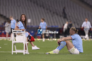 2023-06-10 - Erling Haaland of Manchester City and Isabel Johansen celebrate following the UEFA Champions League Final football match between Manchester City FC and FC Internazionale (Inter Milan) on June 10, 2023 at Ataturk Olympic Stadium in Istanbul, Turkey - FOOTBALL - CHAMPIONS LEAGUE - FINAL - MANCHESTER CITY V INTERNAZIONALE - UEFA CHAMPIONS LEAGUE - SOCCER