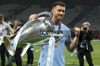 2023-06-10 - Aymeric Laporte of Manchester City celebrates with the trophy following the UEFA Champions League Final football match between Manchester City FC and FC Internazionale (Inter Milan) on June 10, 2023 at Ataturk Olympic Stadium in Istanbul, Turkey - FOOTBALL - CHAMPIONS LEAGUE - FINAL - MANCHESTER CITY V INTERNAZIONALE - UEFA CHAMPIONS LEAGUE - SOCCER