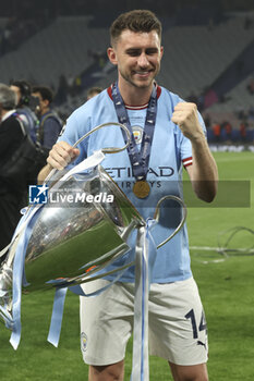 2023-06-10 - Aymeric Laporte of Manchester City celebrates with the trophy following the UEFA Champions League Final football match between Manchester City FC and FC Internazionale (Inter Milan) on June 10, 2023 at Ataturk Olympic Stadium in Istanbul, Turkey - FOOTBALL - CHAMPIONS LEAGUE - FINAL - MANCHESTER CITY V INTERNAZIONALE - UEFA CHAMPIONS LEAGUE - SOCCER