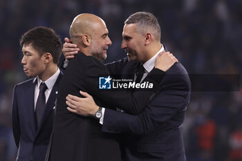 2023-06-10 - Coach of Manchester City Pep Guardiola and Manchester City President Khaldoon Al Mubarak celebrate during the trophy ceremony following the UEFA Champions League Final football match between Manchester City FC and FC Internazionale (Inter Milan) on June 10, 2023 at Ataturk Olympic Stadium in Istanbul, Turkey - FOOTBALL - CHAMPIONS LEAGUE - FINAL - MANCHESTER CITY V INTERNAZIONALE - UEFA CHAMPIONS LEAGUE - SOCCER