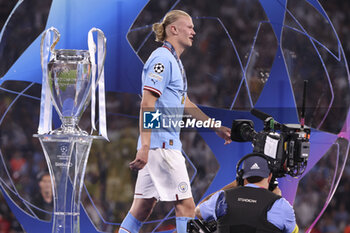 2023-06-10 - Erling Haaland of Manchester City celebrates during the trophy ceremony following the UEFA Champions League Final football match between Manchester City FC and FC Internazionale (Inter Milan) on June 10, 2023 at Ataturk Olympic Stadium in Istanbul, Turkey - FOOTBALL - CHAMPIONS LEAGUE - FINAL - MANCHESTER CITY V INTERNAZIONALE - UEFA CHAMPIONS LEAGUE - SOCCER