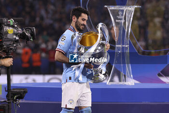 2023-06-10 - Ilkay Gundogan of Manchester City celebrates during the trophy ceremony following the UEFA Champions League Final football match between Manchester City FC and FC Internazionale (Inter Milan) on June 10, 2023 at Ataturk Olympic Stadium in Istanbul, Turkey - FOOTBALL - CHAMPIONS LEAGUE - FINAL - MANCHESTER CITY V INTERNAZIONALE - UEFA CHAMPIONS LEAGUE - SOCCER